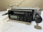 Kenwood KRC-1004 Mustang Cassette Radio Faceplate Harness Missing One Knob. Fixed Price $79.99.