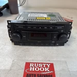 2007 Jeep Compass Radio P05064354A1. Fixed Price $51.00.