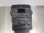 Ford Explorer Base Radio And Temperature Control Panel JB5T18A802JA. Fixed Price $125.00.