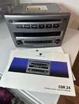 Oem Porsche 987 Cayman Boxster Pcm Radio Player CDR24 Original W/manuals. Fixed Price $200.00.