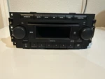 2005-07 Dodge Dakota Radio Receiver Display Am-fm Cd Single Disc Ref P05064173AH. Fixed Price $64.99.