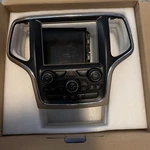 2014 Jeep Grand Cherokee Oem Stereo Control Center. Fixed Price $160.00.