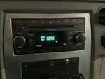 Audio Equipment Radio AM-FM-CD-MP3 Face Plate Id Res Fits 08-10 Dakota 350993. Fixed Price $73.33.