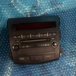 2007-2013 Mitsubishi Outlander Cd Am/fm Bezel Radio Oem 8002A073XA Hazard Button. Fixed Price $99.00.