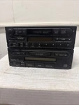 Mazda CE-3430TY1A W/ Stacked Panasonic 1V01 Auto Disc Changer Used (D-5). Fixed Price $115.00.
