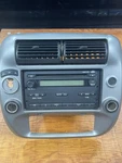 2007-2011 Ford Ranger Center Dash Bezel W/radio 4WD Silver 7L5T-18C869-AC. Fixed Price $129.00.