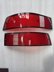 Set Of Nos 1973-89 Porsche 911 Bosch Rear Taillight Lenses W/ Black Trim. Fixed Price $350.00.