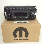 New Oem Mopar Fm 6 Cd MP3 Wma Radio 2007-2010 Chrysler Dodge Req. Fixed Price $125.00.
