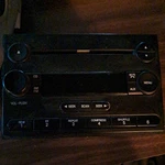 2005-07 Ford Radio 6 Disc Changer. Fixed Price $40.00.