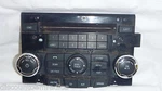 10 11 Ford Fusion Mercury Milan Radio Panel Face Plate 9E5T-18A802-AE Bulk 6003. Fixed Price $5.00.