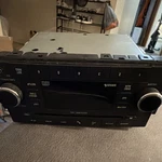 2010 Dodge Ram 1500 Stock Radio. Fixed Price $50.00.