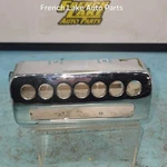 Replated Radio Bezel Fits 1946-1947 Cadillac 1323486. Fixed Price $125.00.