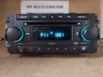 Genuine 2004 - 2010 Chrysler Dodge Jeep Factory Radio MP3 Cd Player Ref W/ Aux. Fixed Price $108.97.